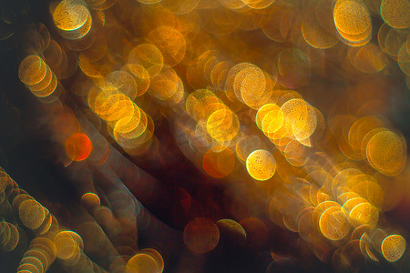 金色飘带摄影照片_闪闪发光的金色飘带 — 圣诞假期背景