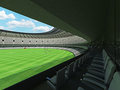 美丽的现代圆形澳式足球场，设有白色座椅和贵宾包厢