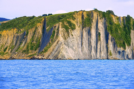 吉普斯摄影照片_Flysch 悬崖，巴斯克海岸联合国教科文组织世界地质公园，西班牙吉普斯夸