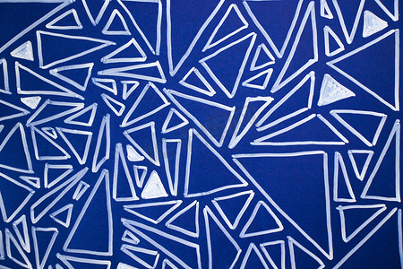 蓝纸和白色几何图形三角形背景和纹理特写