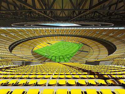 有黄色位子和贵宾包厢的大美丽的现代足球场