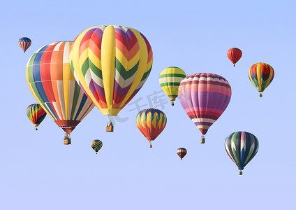 彩色漂浮气球摄影照片_一群漂浮着的彩色热气球