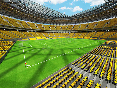 有黄色位子和贵宾包厢的大美丽的现代足球场