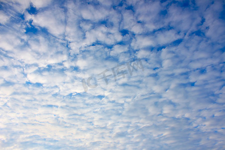 云纹连续图案摄影照片_晴间多云背景