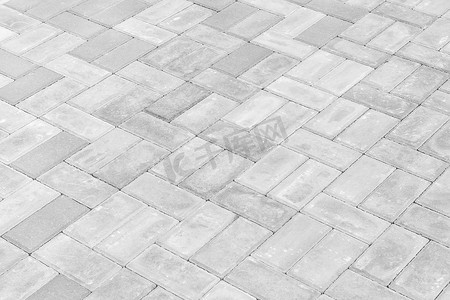 黑线框正方形摄影照片_灰色铺路板城市街道路地砖纹理背景