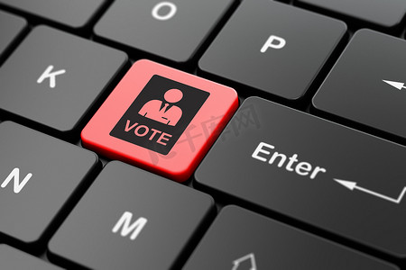 红色政治摄影照片_政治概念： 计算机键盘背景上的选票