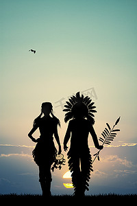 印地安人夫妇剪影在日落