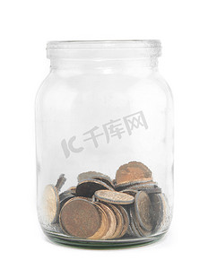 玻璃储蓄或小费瓶中的硬币