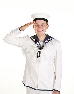 敬礼的青少年摄影照片_年轻的水手敬礼孤立的白色背景