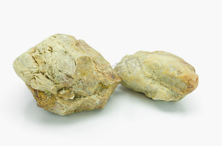 鹅卵石元素摄影照片_白色背景上的石头。