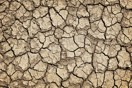 地球背景摄影照片_在干旱期间干裂的地面