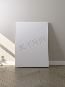 地板上的白色海报，带有供您设计的空白框架模型