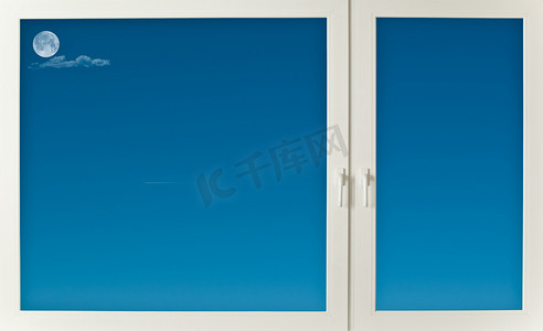 月亮飞机摄影照片_飞机透过窗户