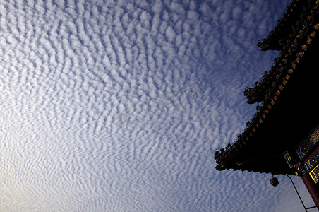 云纹连续图案摄影照片_古建筑上空的云景