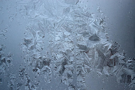 冬天窗户背景摄影照片_窗户上的霜