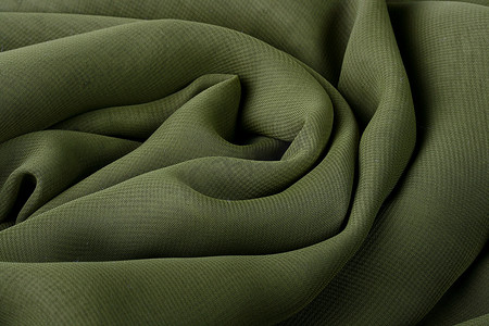 深绿色装饰摄影照片_深绿色织物
