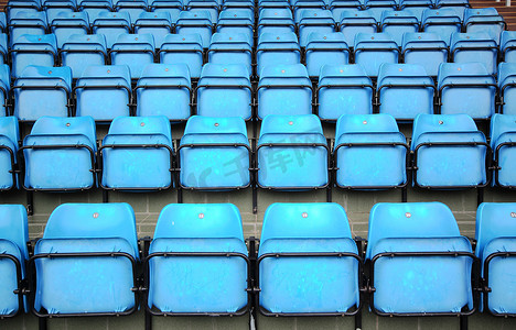盲人音乐会摄影照片_体育场的蓝色座位
