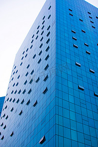 高楼蓝色摄影照片_蓝色的摩天大楼