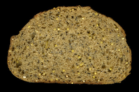 南瓜小米摄影照片_一片全麦面包