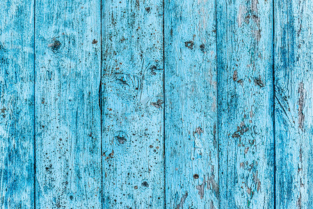 蓝色剥落油漆、抽象木板背景的旧木栅栏的无缝纹理