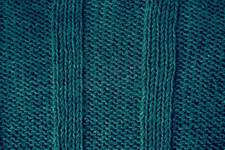 手工编织钩针摄影照片_手工编织背景与细节羊毛线。