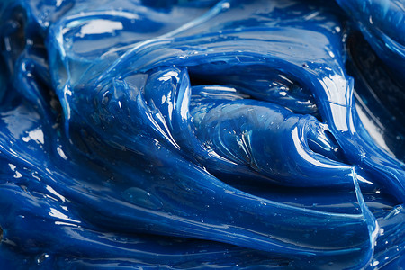 高温工作摄影照片_Grease, Blue 优质合成复合锂基润滑脂，适用于汽车和工业的高温和机械润滑。