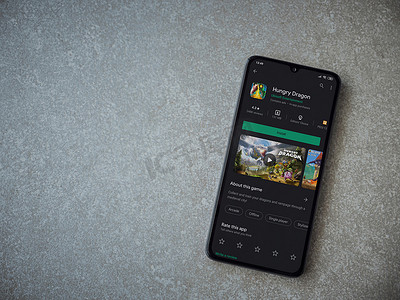 黑色手机显示屏上的饥饿龙应用程序商店页面