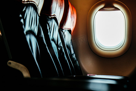 机场座椅摄影照片_飞机经济舱的座位