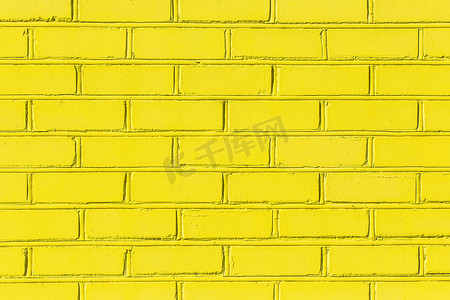 黄色油漆亮光砖旧城墙纹理背景
