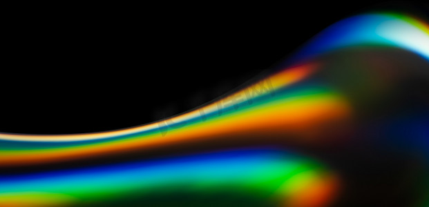 明亮的彩虹全息液体抽象背景。