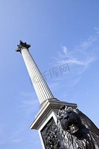 特拉法尔加摄影照片_伦敦特拉法加广场的狮子雕像和纳尔逊纪念柱