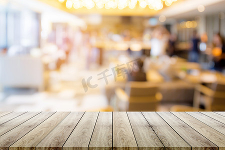 有趣桌面摄影照片_带有餐厅模糊散景背景的空木桌面 — 可以