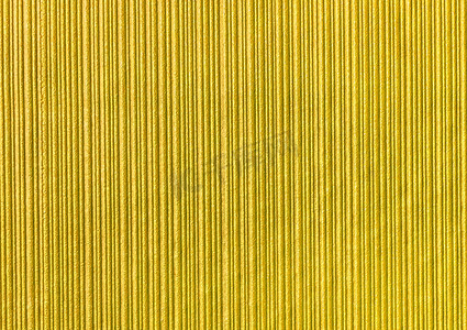 金纸摄影照片_黄色抽象条纹图案墙纸背景，金纸纹理与垂直线