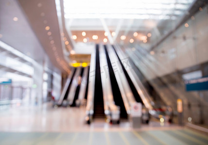 模糊机场自动扶梯的背景以供使用。