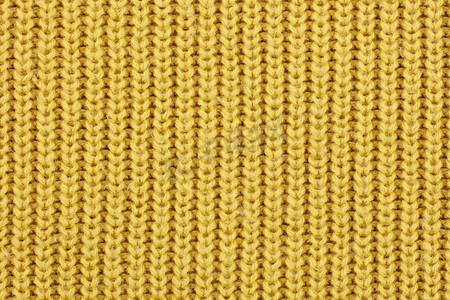 黄色针织带肋羊毛纺织品背景纹理