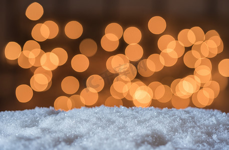雪冬圣诞背景与光散景闪闪发光的效果