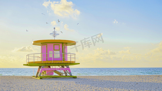 佛罗里达州迈阿密海滩上的救生员小屋，迈阿密海滩日出时海滩上色彩缤纷的小屋