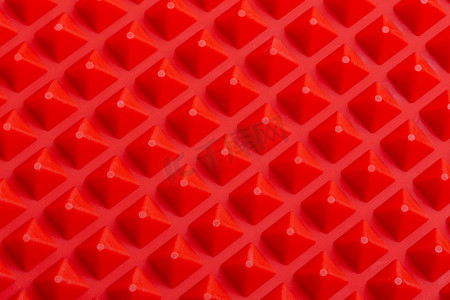 抽象红色硅胶金字塔阵列特写背景