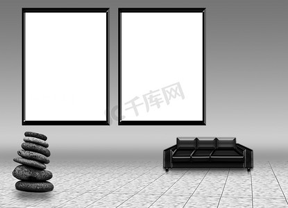 两个白色框架的模拟海报和一张沙发躺在地板上，一块装饰性的石头相互堆叠。
