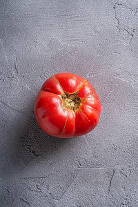 国画西红柿摄影照片_一种粉色传家宝番茄蔬菜，新鲜的红熟番茄