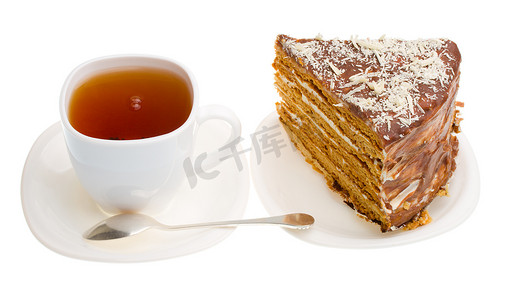 茶杯和一块自制的蜂蜜蛋糕