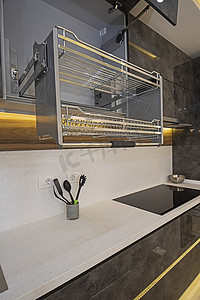 现代厨房设计摄影照片_豪华公寓的现代厨房设计