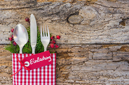 圣诞节菜单摄影照片_圣诞晚餐菜单表餐位设置，假日季节背景