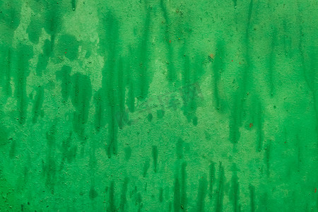 水污脏风化的绿色背景，旧有油漆磨损的金属质感表面墙