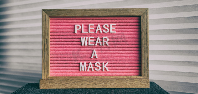 请在商铺入口留言处佩戴口罩粉红色标志。