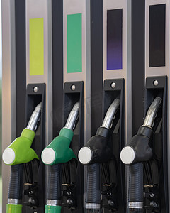 紫色绿色黄色黑色燃料汽油加油机背景。