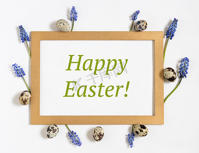 复活节作文，纸空白，文字为复活节快乐、鹌鹑蛋、鲜花和金框。