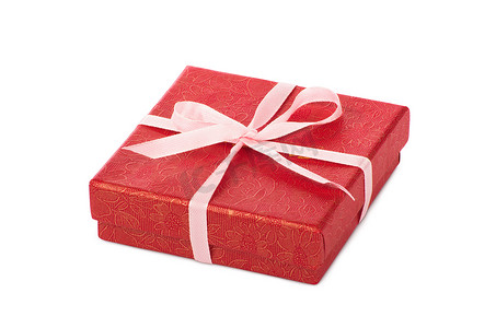 活动礼盒摄影照片_有粉红丝带的单个红色礼盒