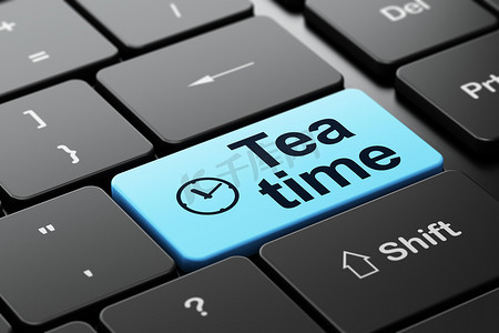 时间轴概念：计算机键盘背景上的时钟和下午茶时间