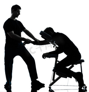 保健按摩椅摄影照片_与椅子的按摩疗法